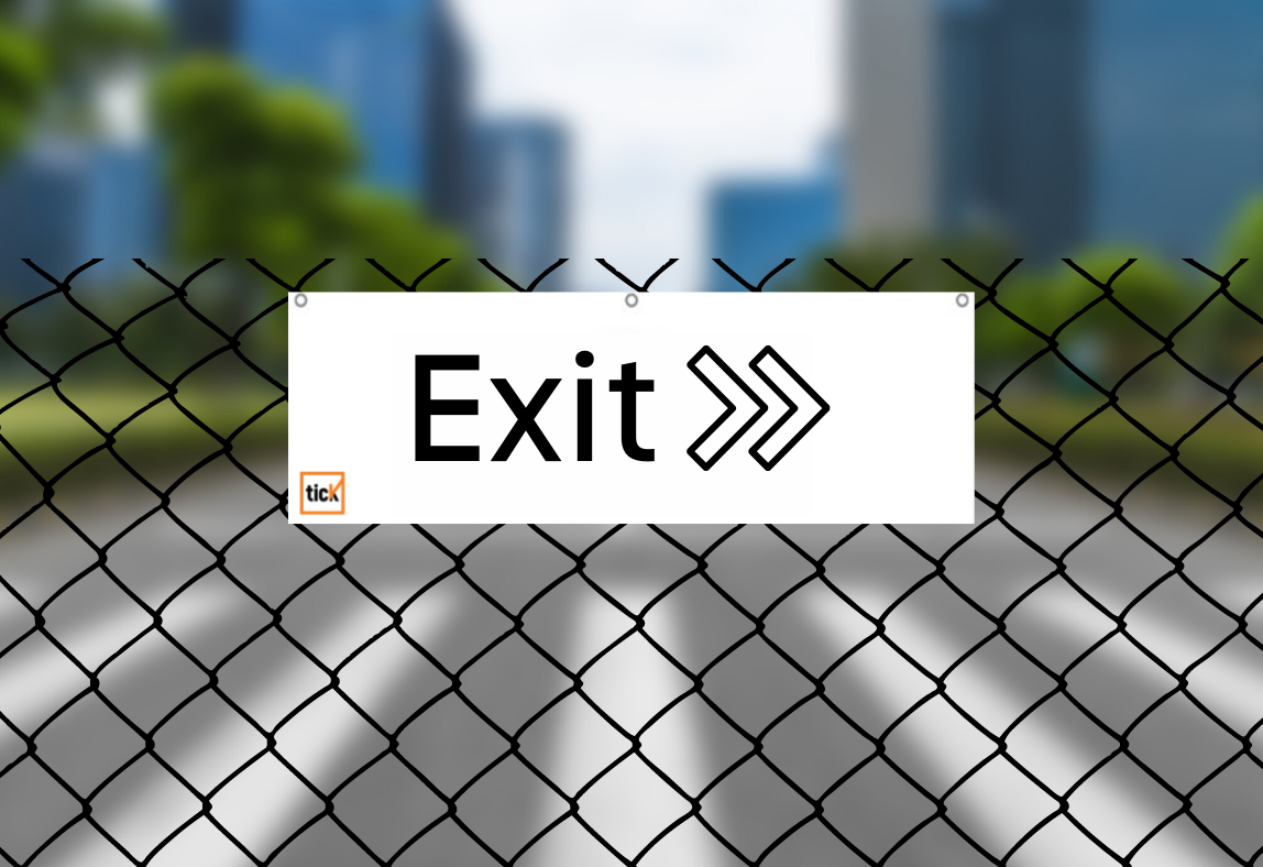 Exit sign on fence
