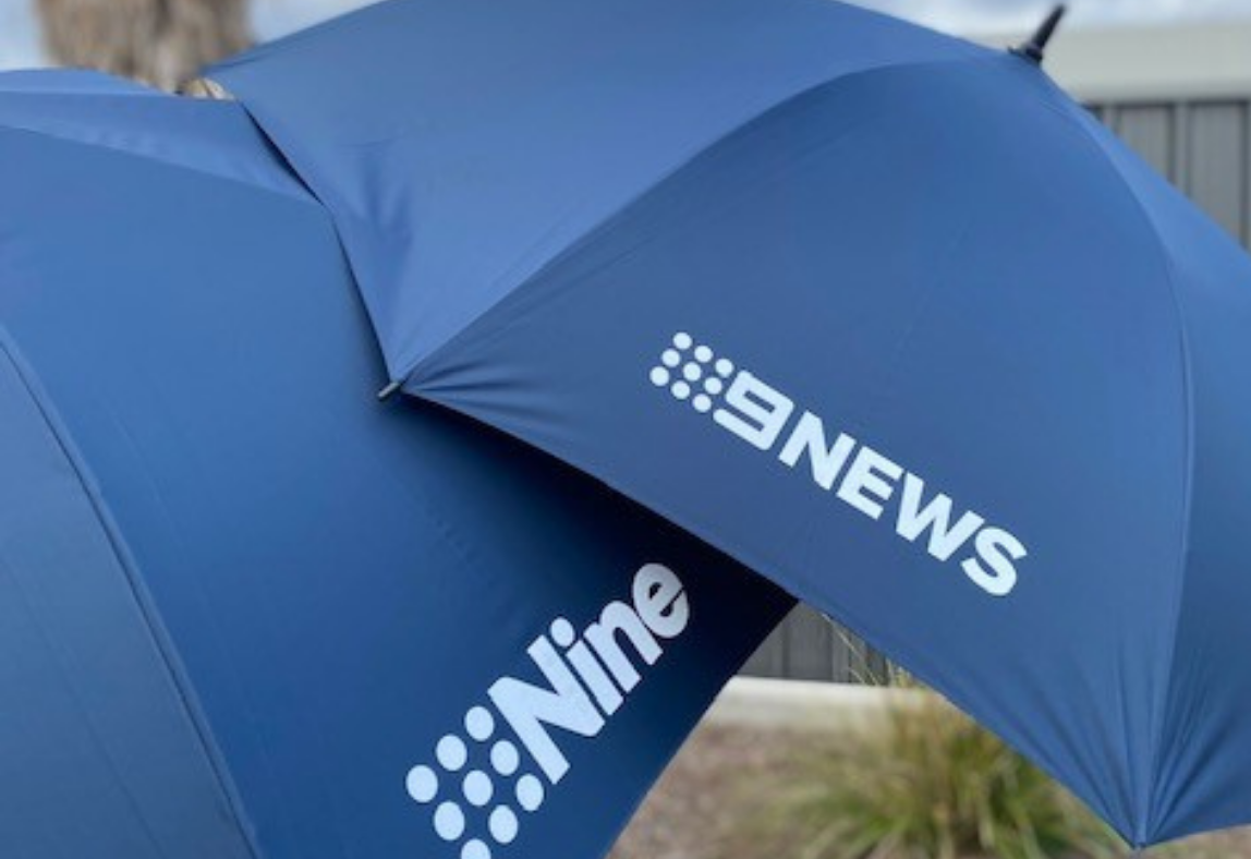 Custom-branded Nine News Umbrellas