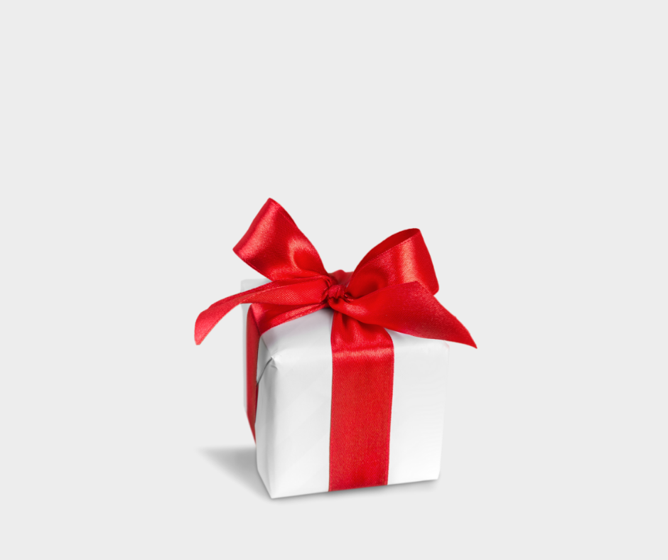 Gift box wrapped in red ribbon