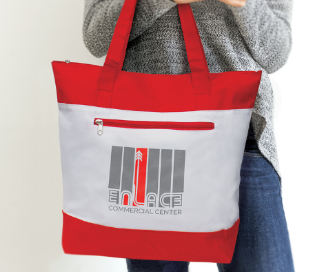 Lady holding conference gift bag