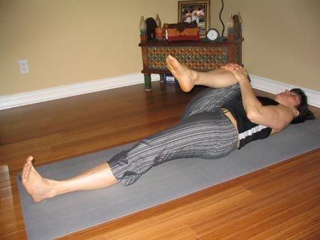 Lying Down Hand To Foot Pose Image -619fc9d3c9637