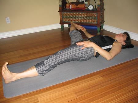 Lying Down Hand To Foot Pose Image -619fc9d42f884