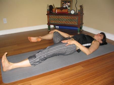 Lying Down Hand To Foot Pose Image -619fc9d48eb98