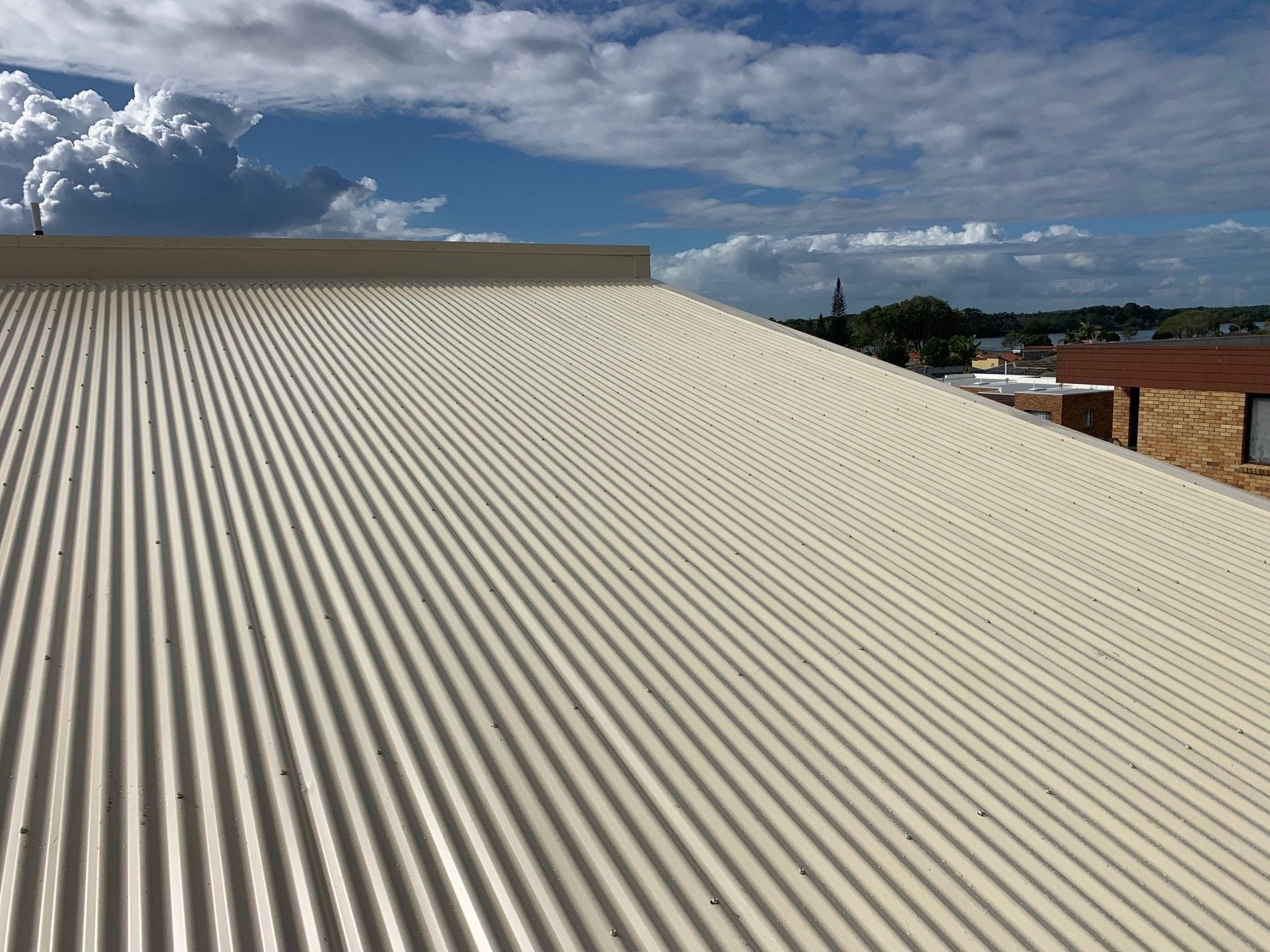 Decramastic Tile Roof to a Colorbond Image -64daf7f4d3ea7