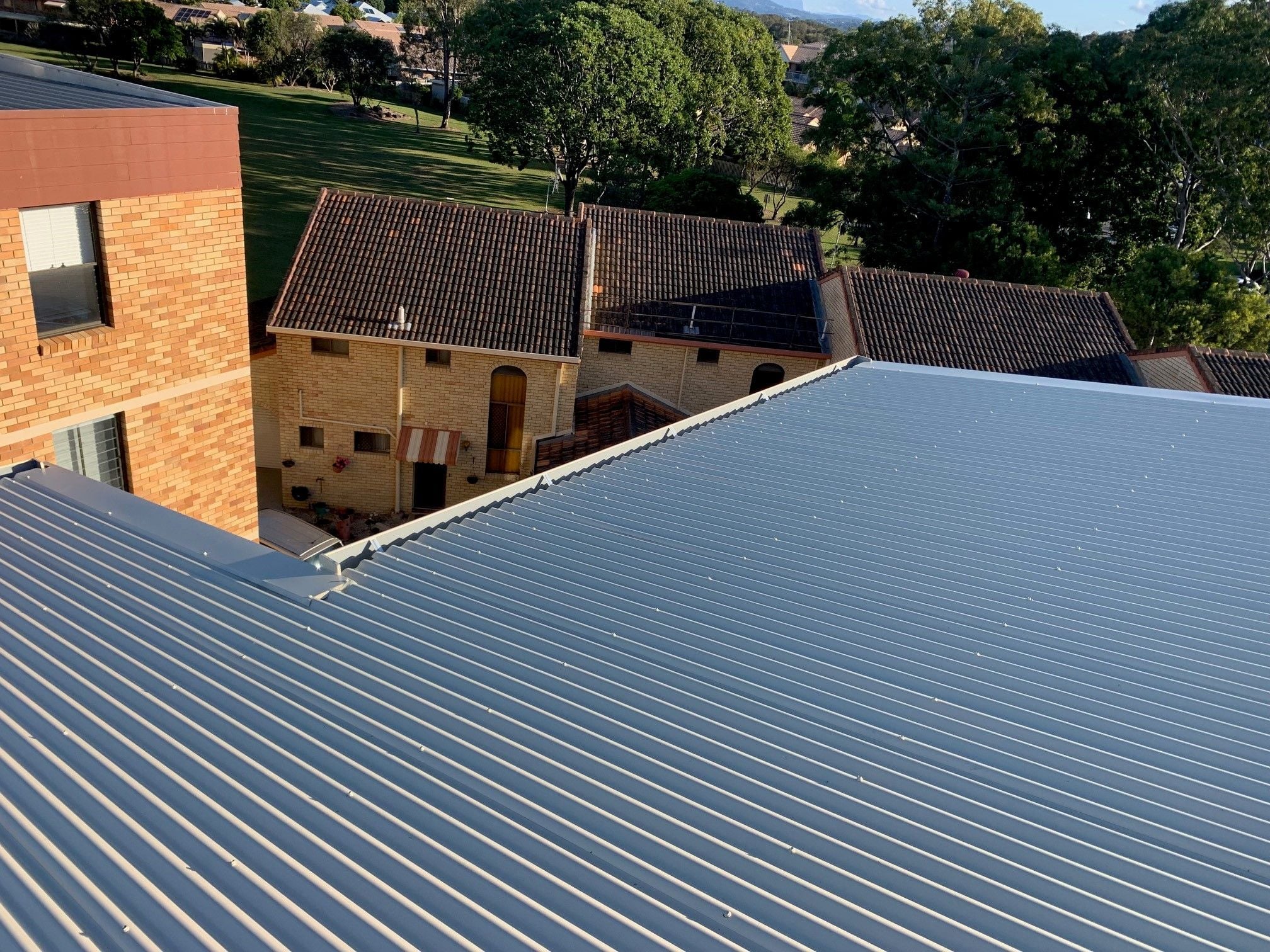 Decramastic Tile Roof to a Colorbond Image -64daf7f5f29cc