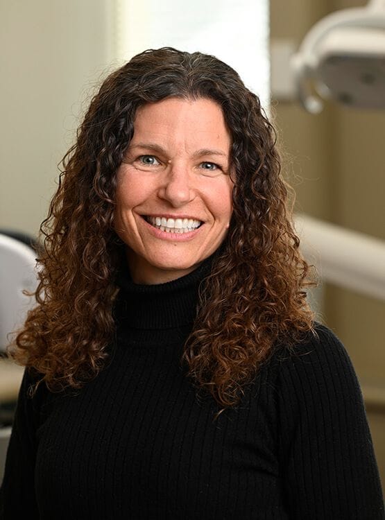 Dr. Erin Heneghan - Alpha Dental Care