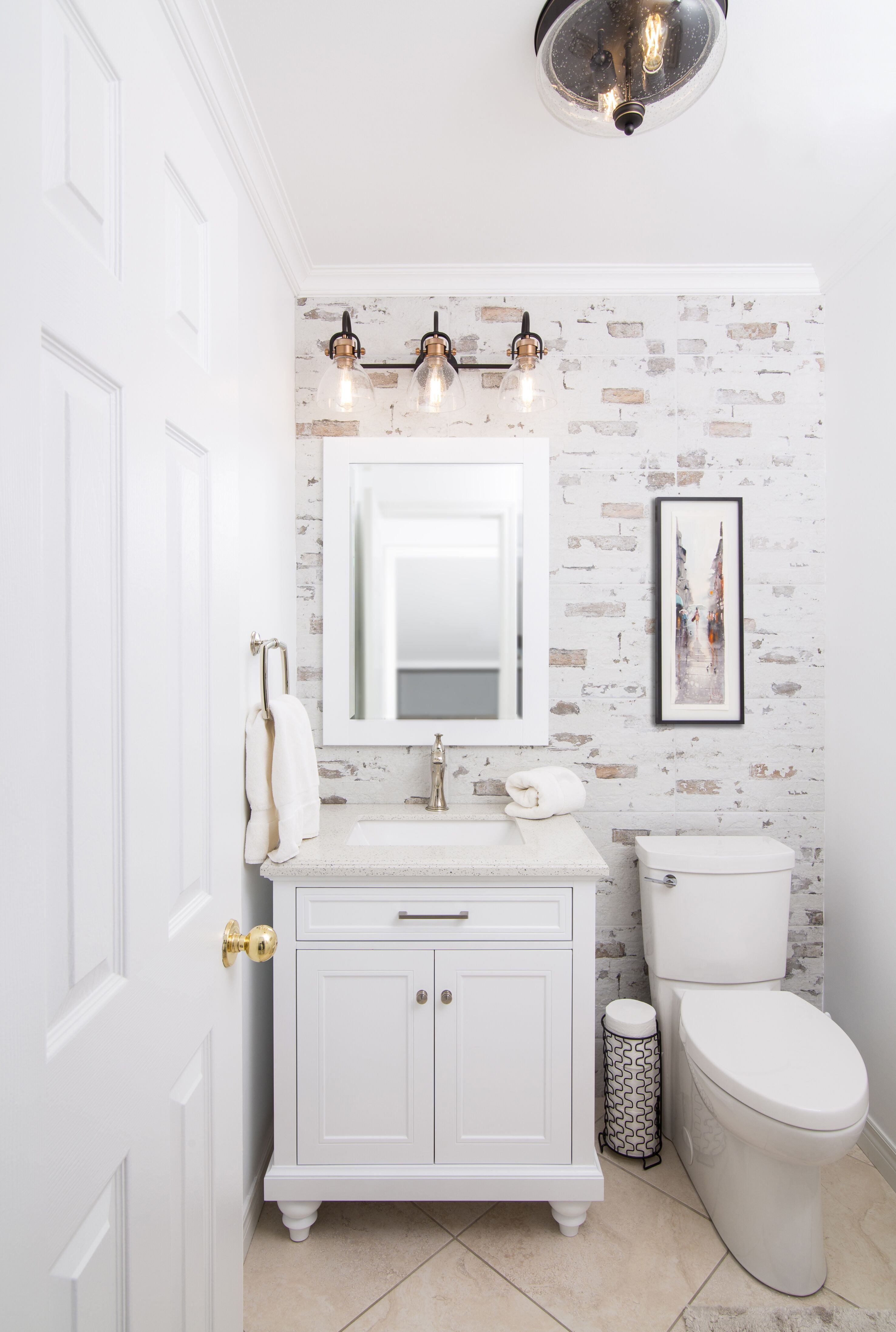 Vanity and toilet fits nicely into the renovated bathroom - making the most of the available space