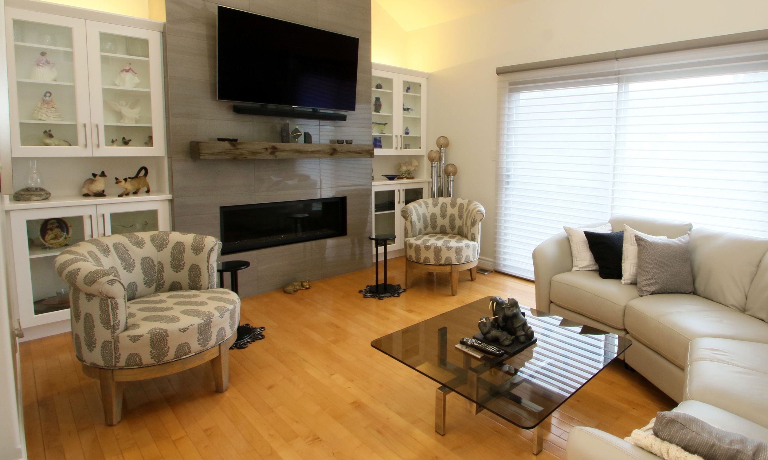 Relax in comfort with this family room design that includes gas fireplace, TV and cozy seating when you can watch the game and have great conversations