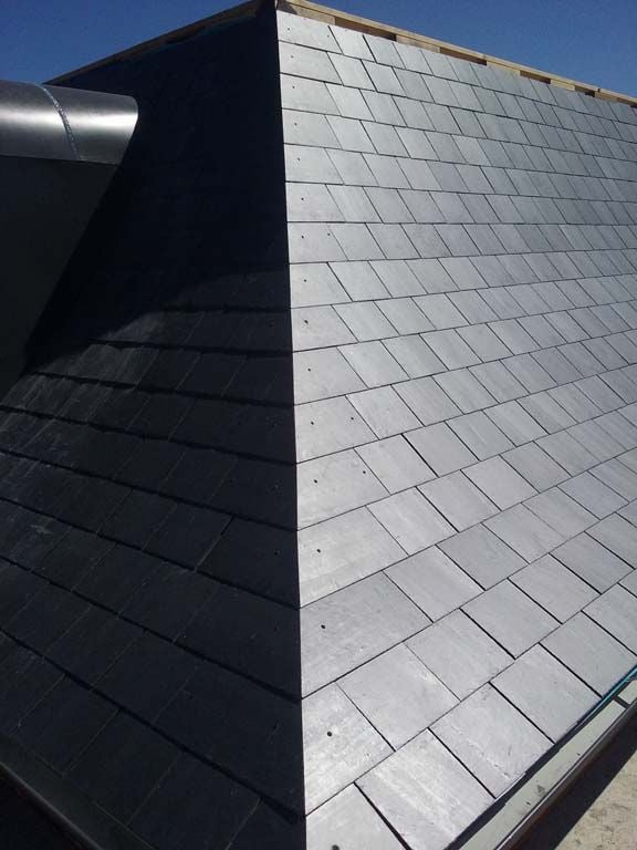 Spanish Slate curved roof with mitred hip
