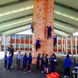 Rock Climbing walls set up inside school sports centres