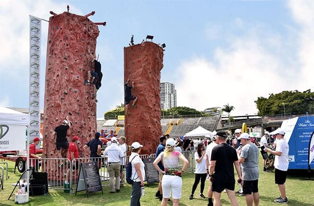 Outdoor corporate function with rock climbing walls