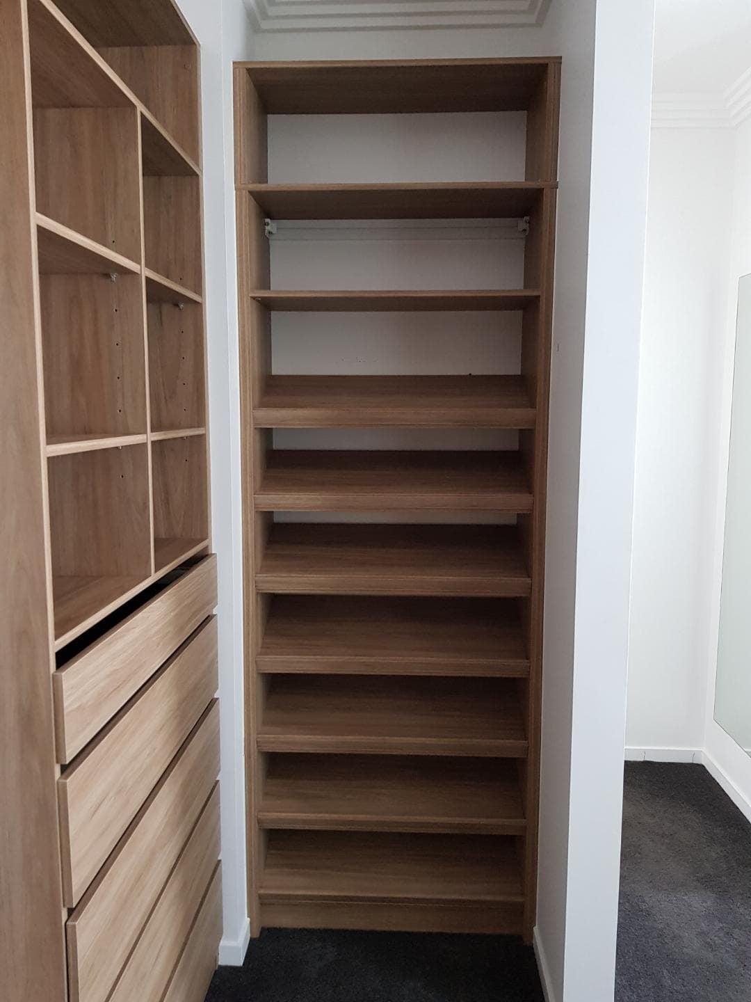 Full colour WIR using Laminex Sublime Teak MR MDF . No backing. Raised lip drawer fronts and secondary top shelf. Combination of flat and sloping shoe shelves