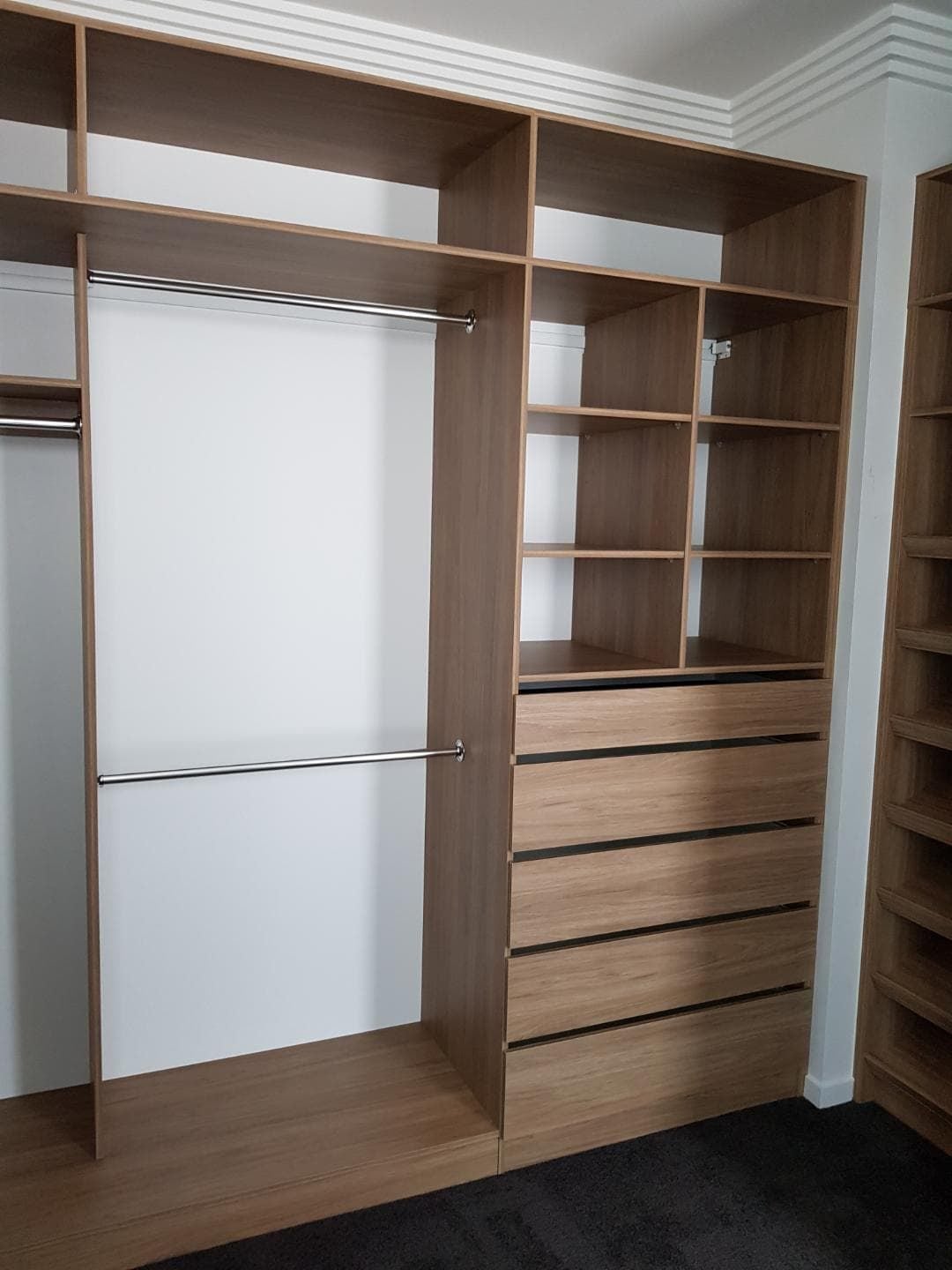 Full colour WIR using Laminex Sublime Teak MR MDF . No backing. Raised lip drawer fronts and secondary top shelf