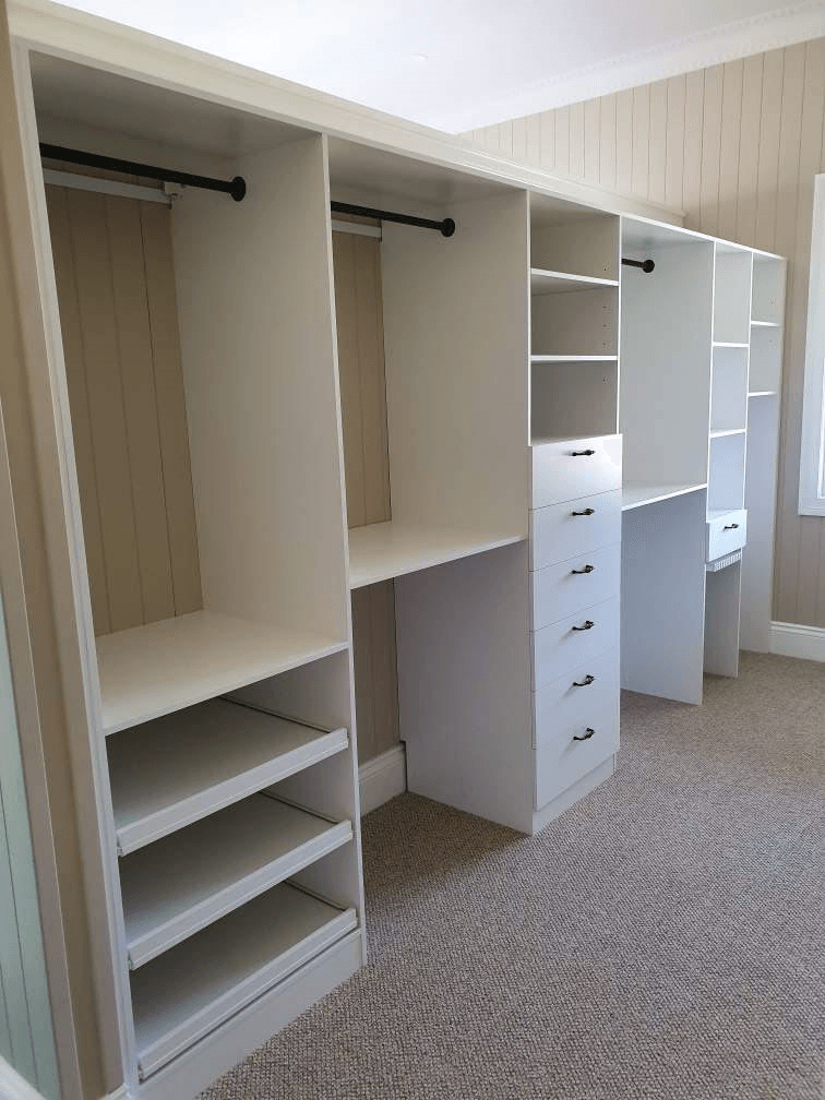 Galley style WIR using white HMR Melamine. Closed drawers with black handle, black hanging rods & Artia trouser rack
