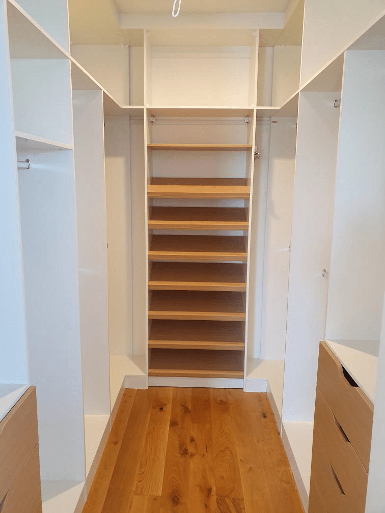White HMR Melamine with Polytec Natural Oak matt sloping shoe shelves and scalloped drawer fronts