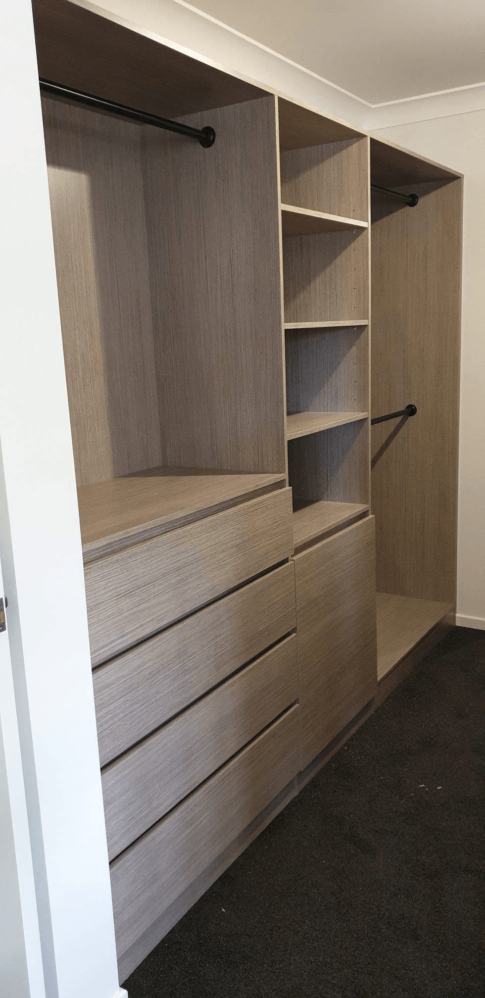 Polytec Roco Lini colour WIR. Black hanging rod, raised lip drawer fronts