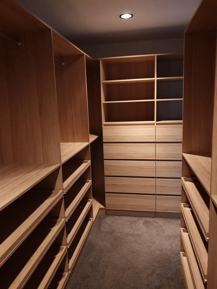 Full colour WIR with full colour backing using Polytec European Walnut Matt MR MDF. Raised lip drawer fronts & slide out shoe shelving