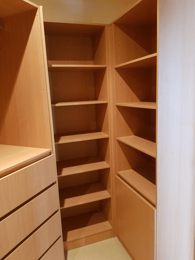Full colour WIR using DR Henderson Sonova Beech. Full colour backing. Raised lip drawer fronts, tilt forward laundry hamper. Designer to suit angled wall for maximum storage