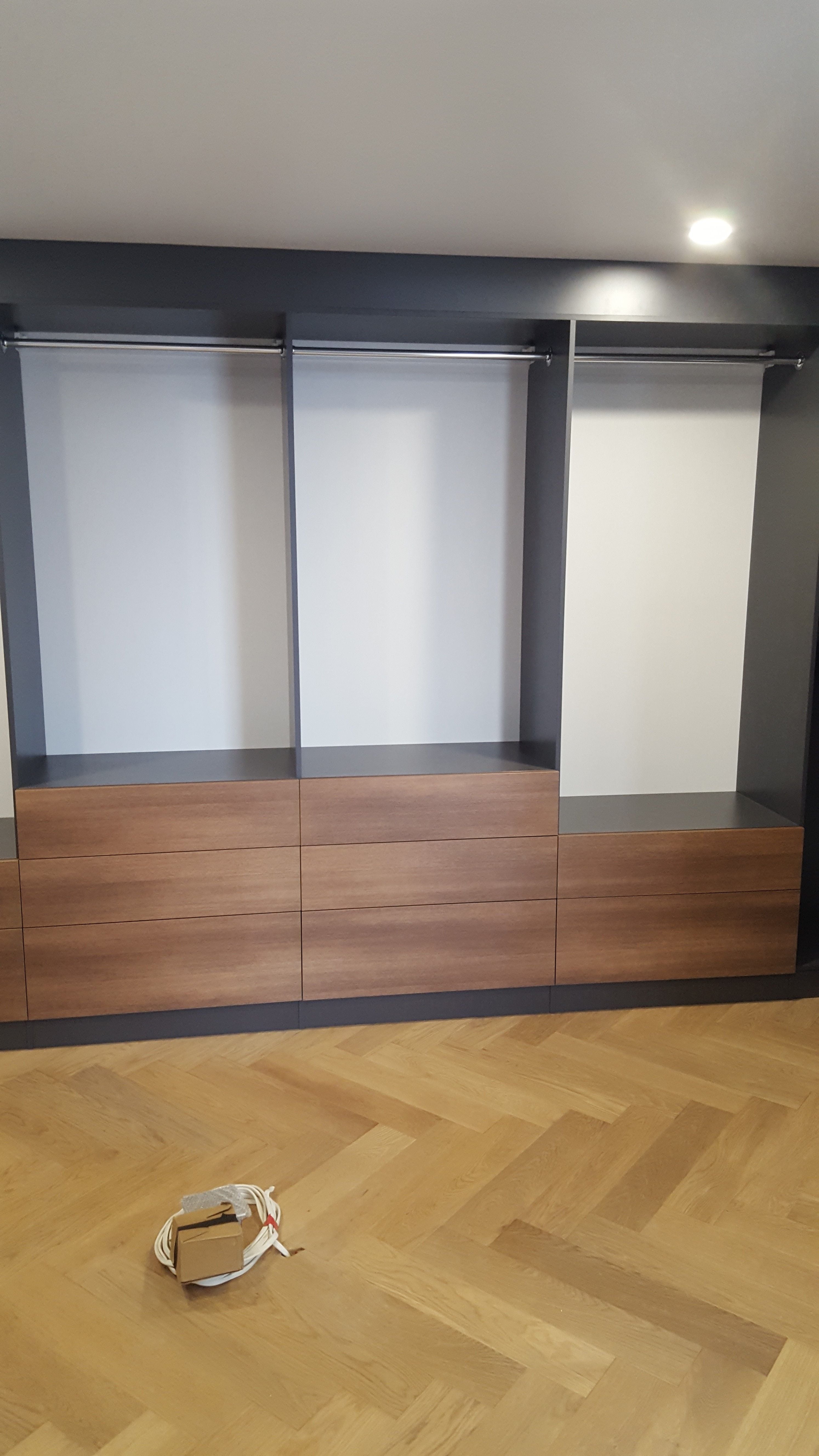 Formica Storm MR MDF with Polytec Notaio Walnut WIR. Bulkhead to ceiling