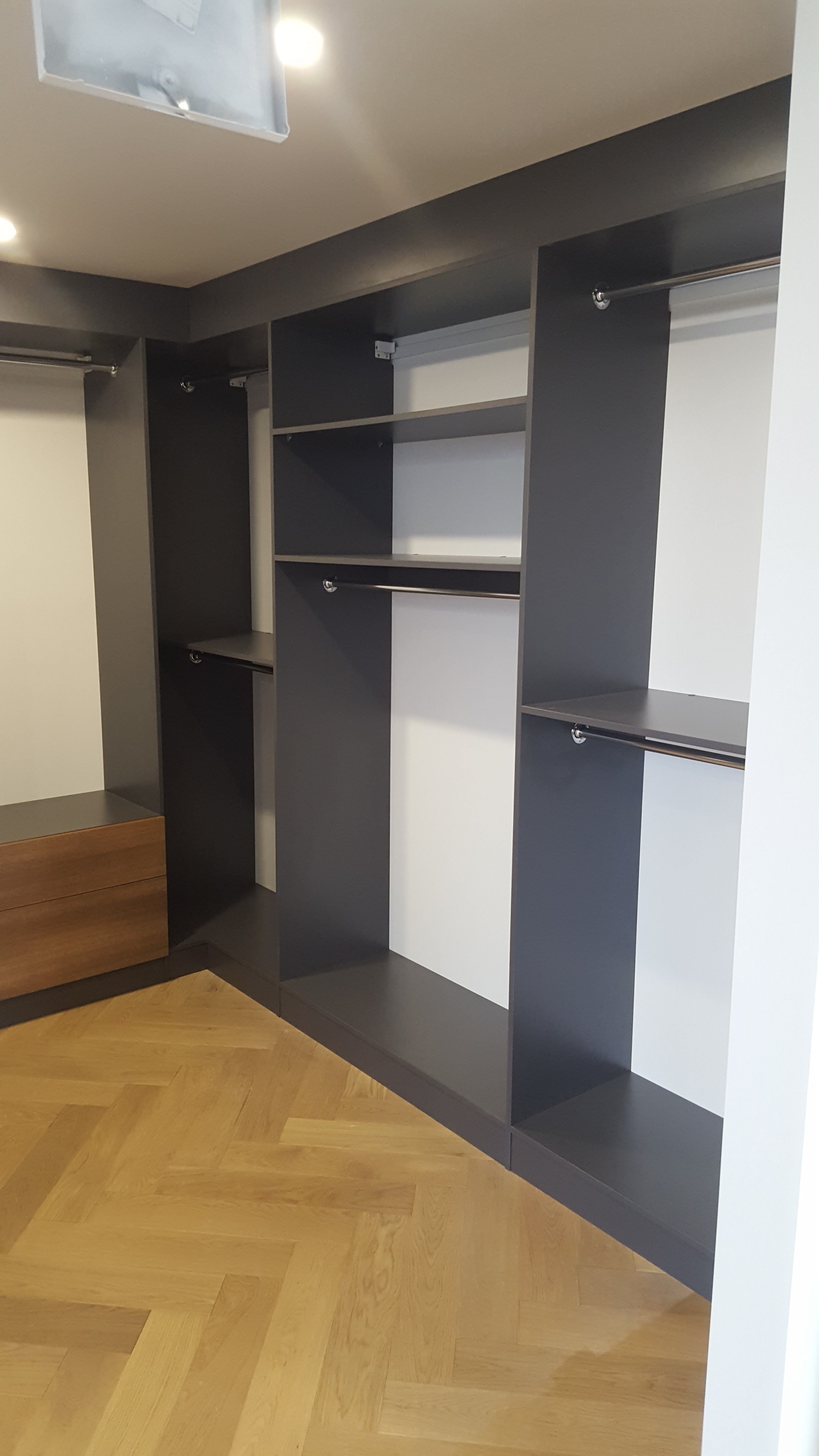 Formica Storm MR MDF with Polytec Notaio Walnut WIR. Bulkhead to ceiling