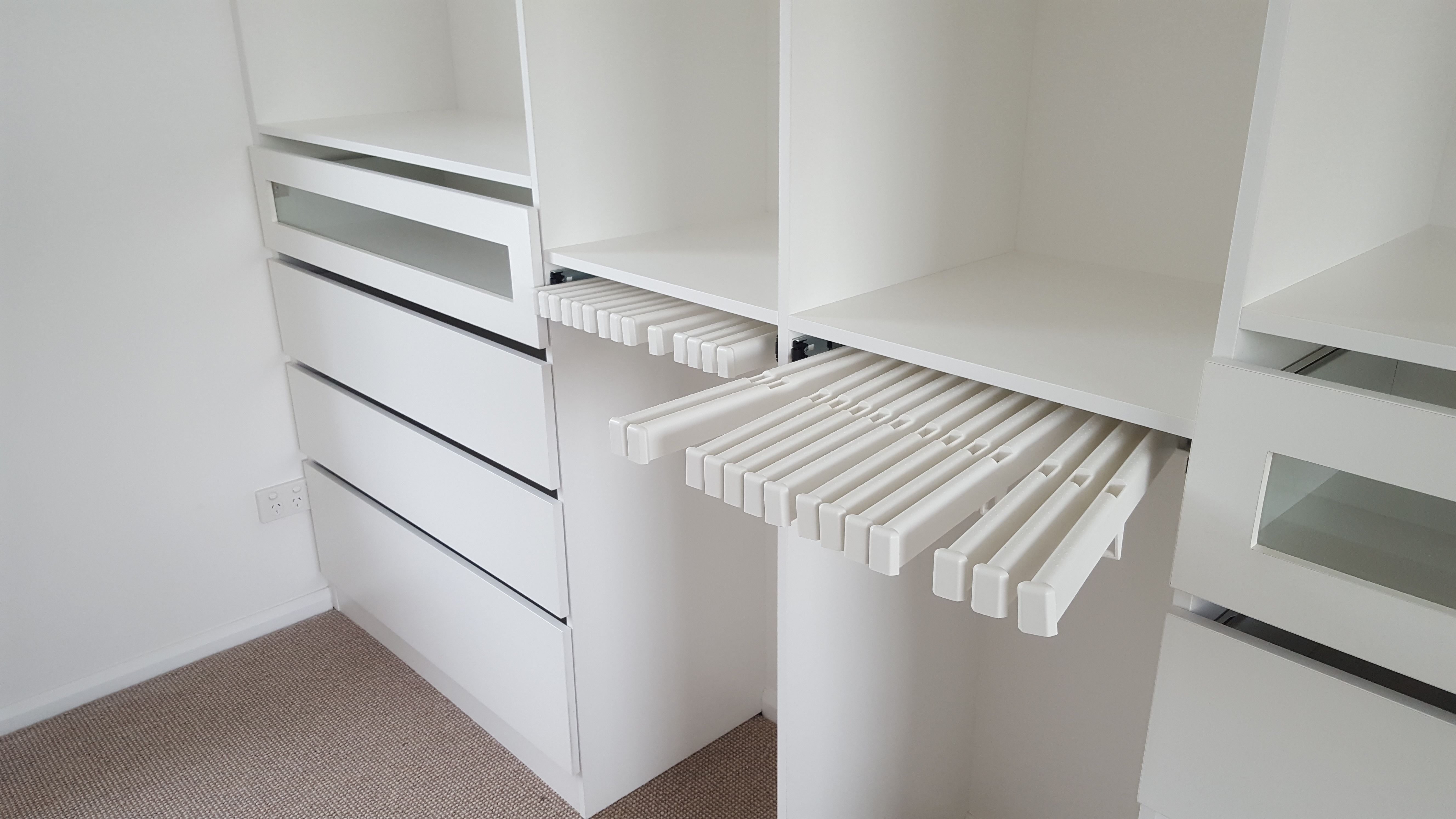 White WIR with Artia trouser racks and drawer fronts with clear glass inserts