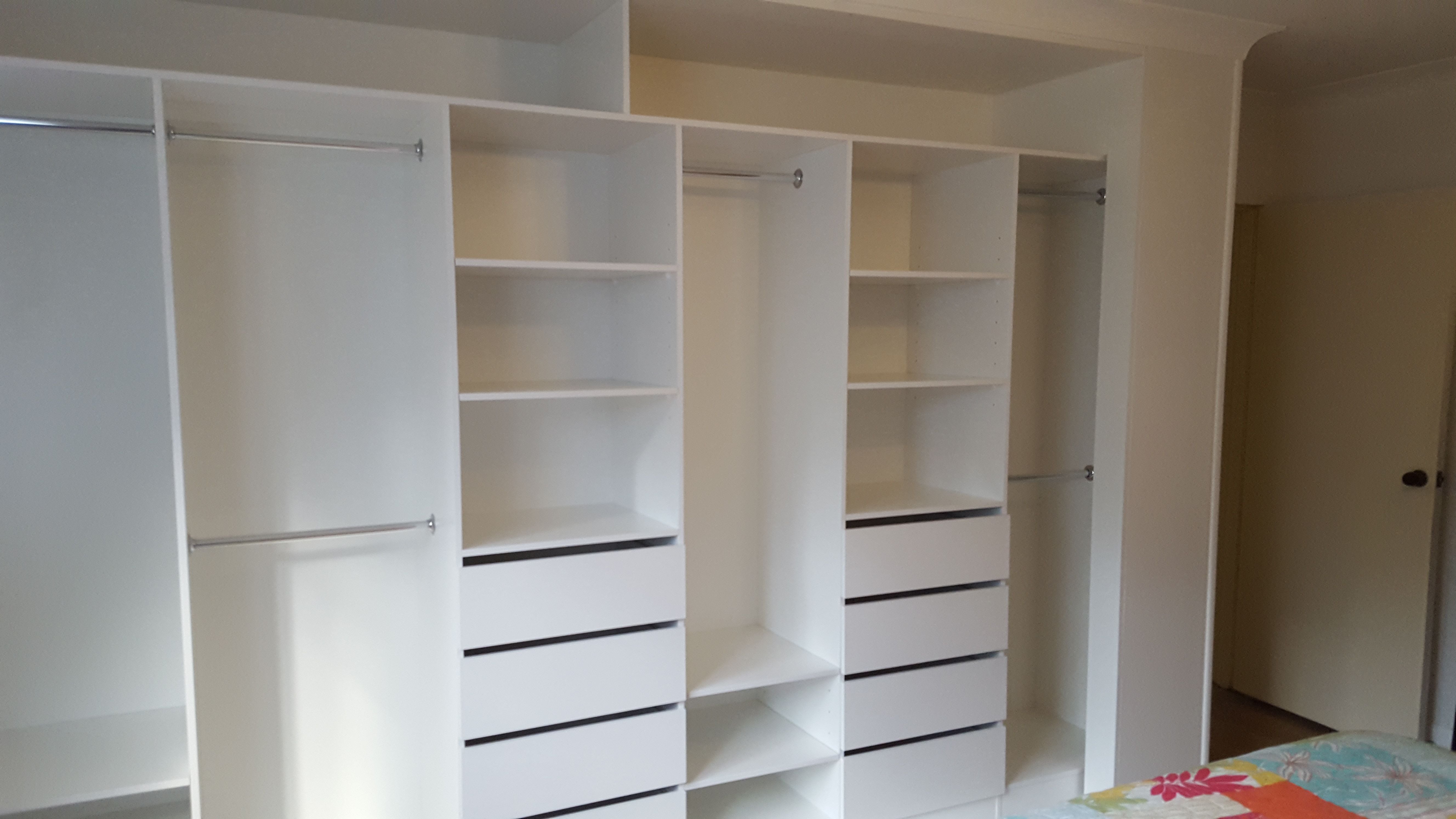 BIR using White HMR Melamine with double and 3/4 hang, open drawer fronts and shelving