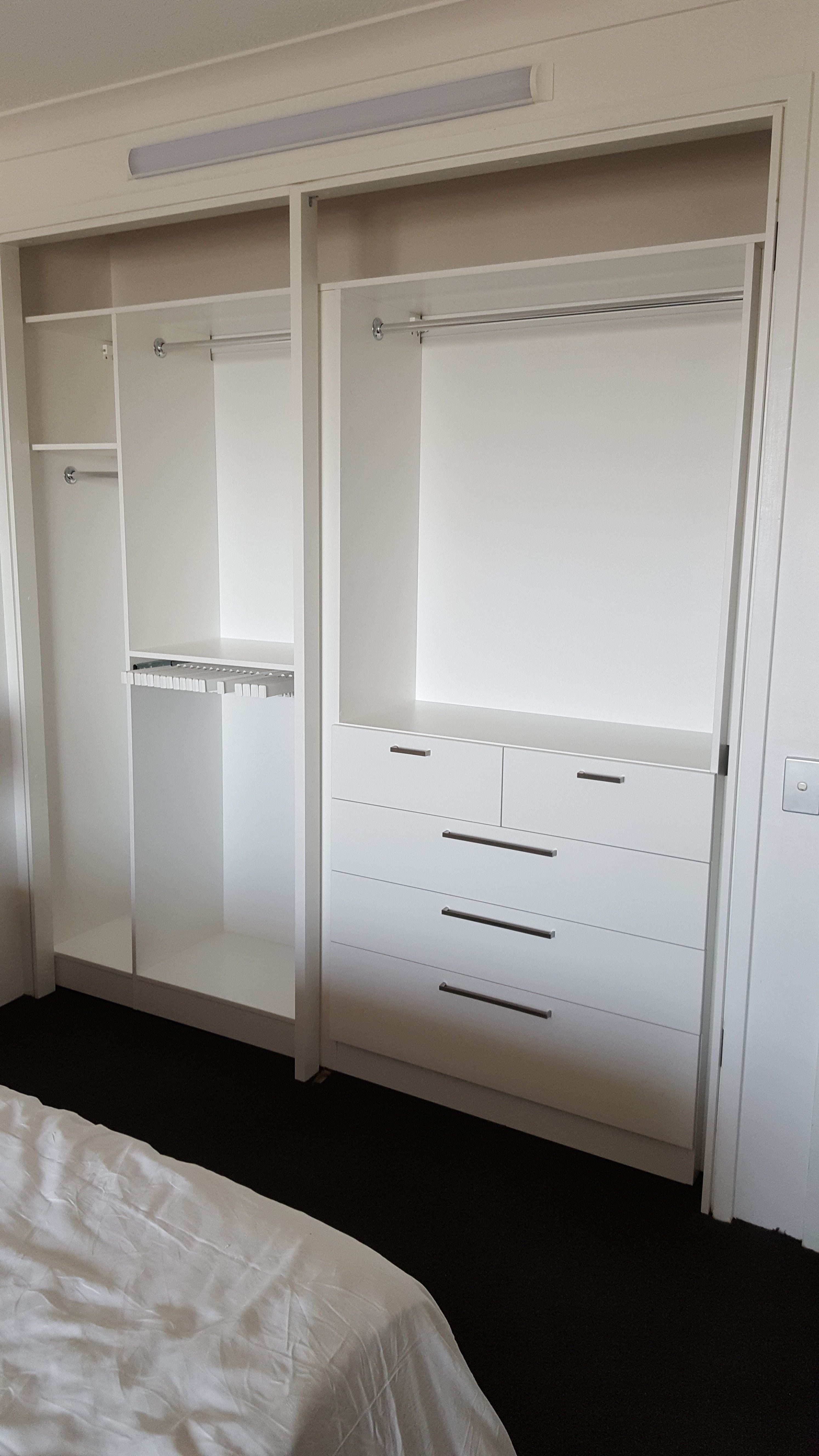 BIR using White HMR Melamine with 3/4 and double hang and a slide out trouser rack