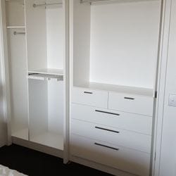 BIR using White HMR Melamine with 3/4 and double hang and a slide out trouser rack