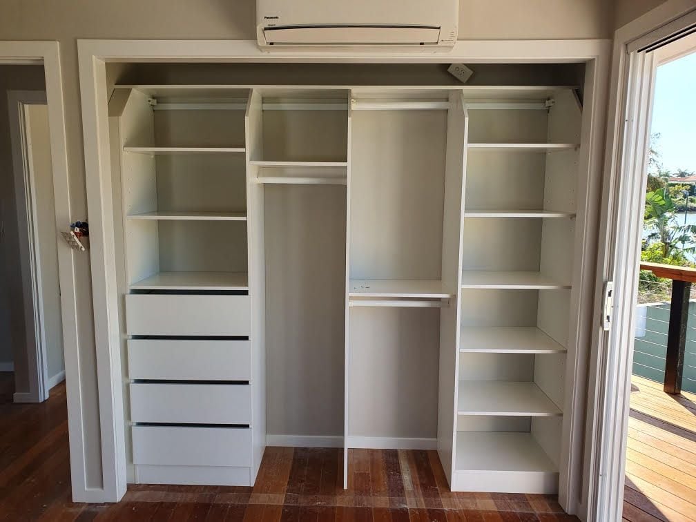 BIR using White HRM Melamine with recessed top shelf, open drawer fronts and shelving