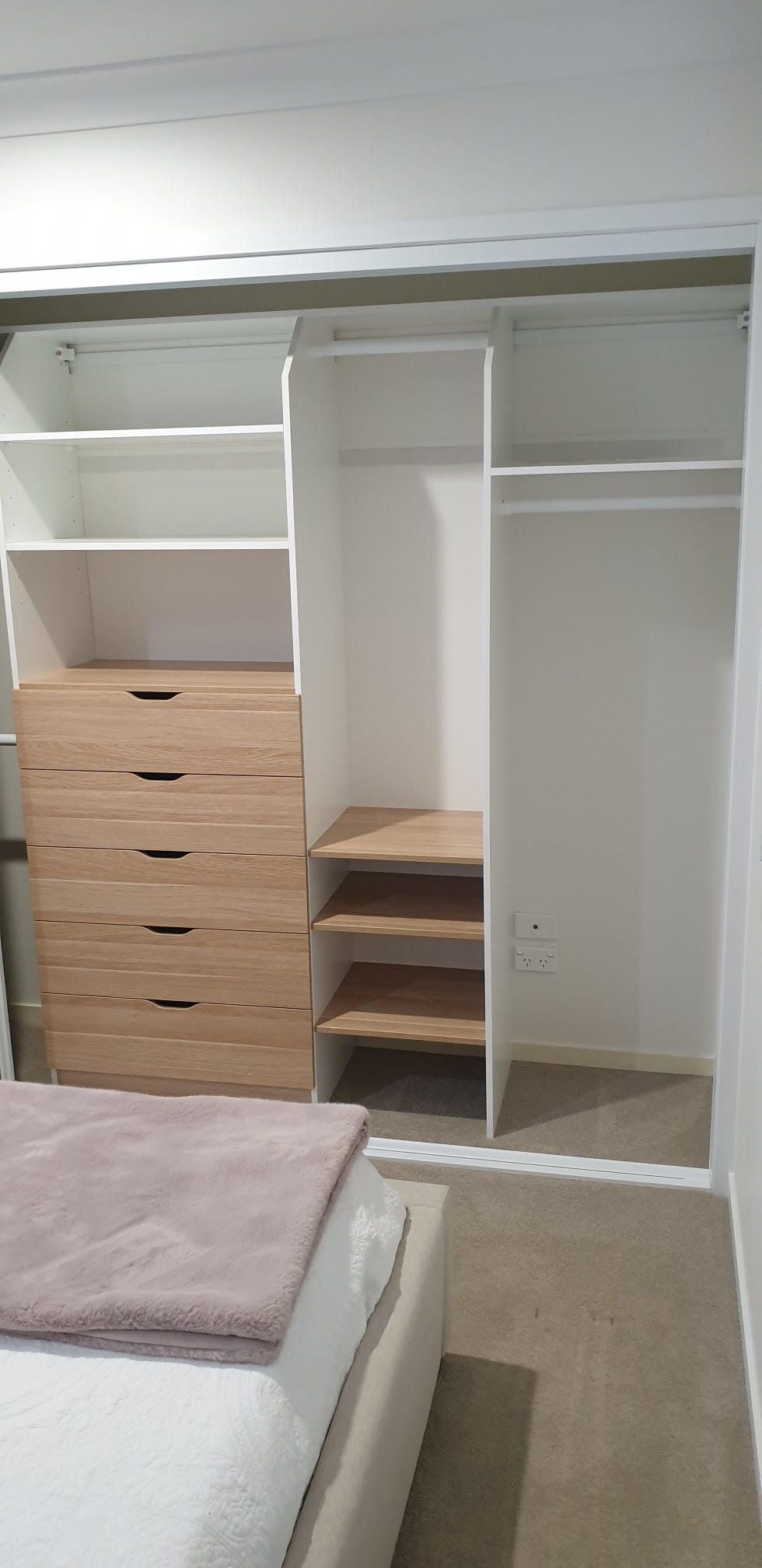 Build in robe using White HMR Melamine and Polytec Natural Oak Matt with scalloped drawer fronts