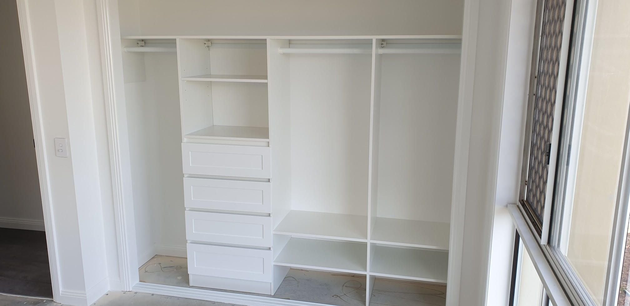 Built in robe using White HMR Melamine with closed drawers with profile drawer fronts