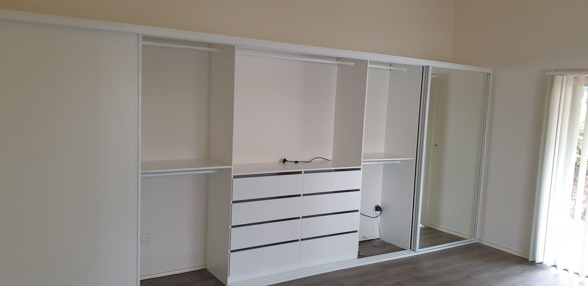 Built in robe using White HMR Melamine with open drawer fronts and double hang using white hanging rail