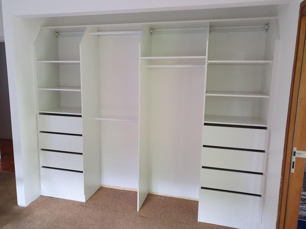 Built in robe using White HMR Melamine with open drawer fronts and shelving