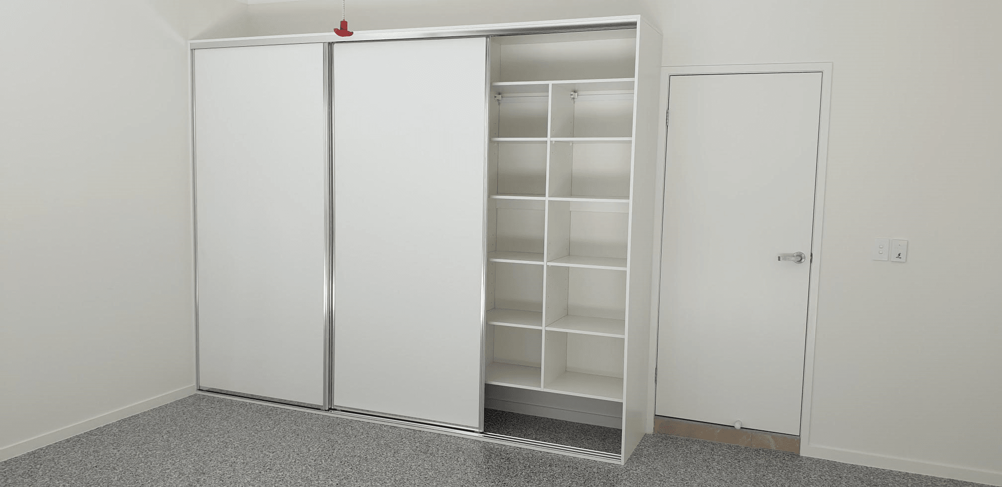 Garage storage with sliding doors. End wall panel using white HMR Melamine. Glacier vinyl sliding doors