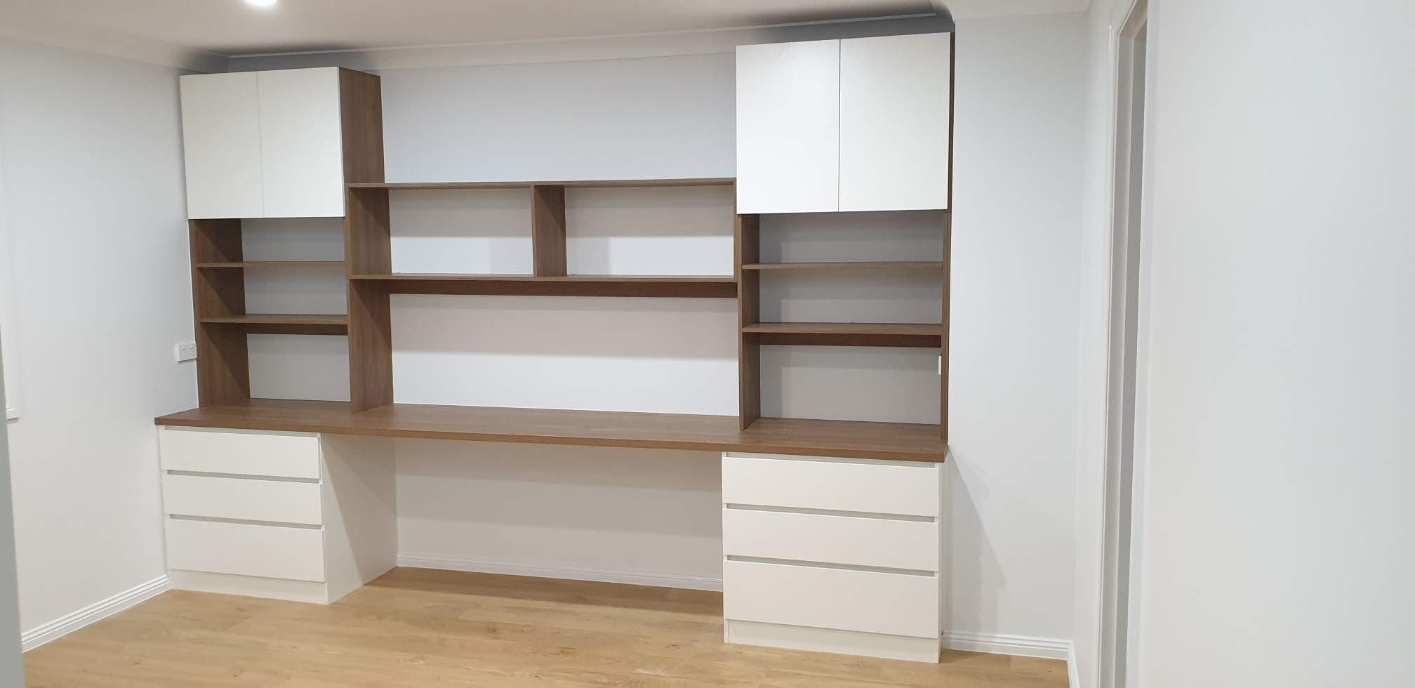 Study desk for child's bedroom using White HMR Melamine & Polytec "Notaio Walnut Woodmatt". 33mm post form desk top