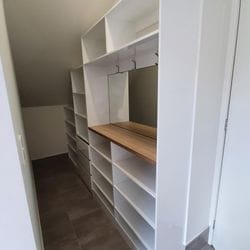Mudroom entry using Polytec "Polar White sheen" MR MDF and bench top using Polytec "Natural Oak Matt". Mirror back panel and hat hooks. Plenty of storage for shoes, school bags, shopping bags etc
