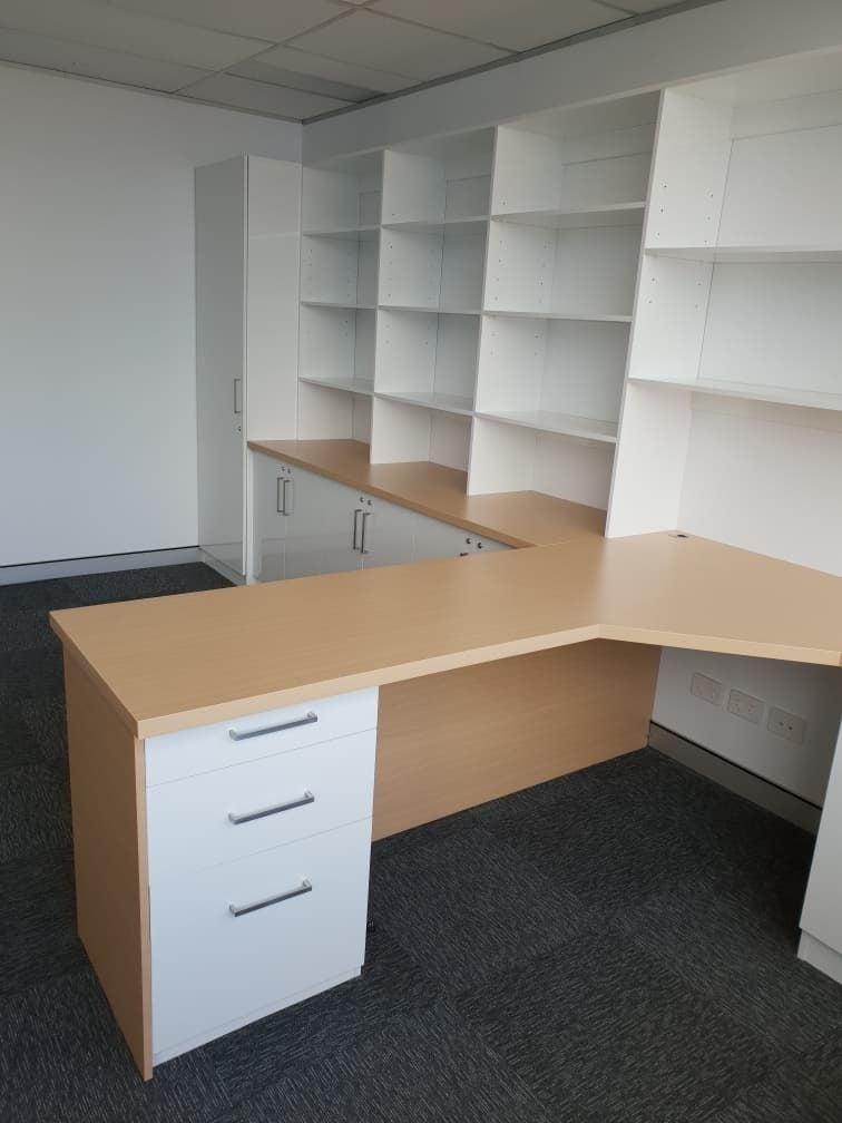 Fit out for Barristers chambers using Polytec "Polar White Sheen", 33mm post form desk top using Polytec "Tuross Oak". All doors and drawer installed with locks