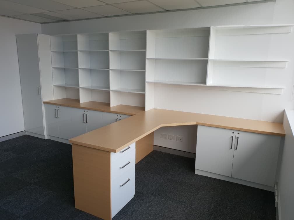 Fit out for Barristers chambers using Polytec "Polar White Sheen", 33mm post form desk top using Polytec "Tuross Oak". All doors and drawer installed with locks