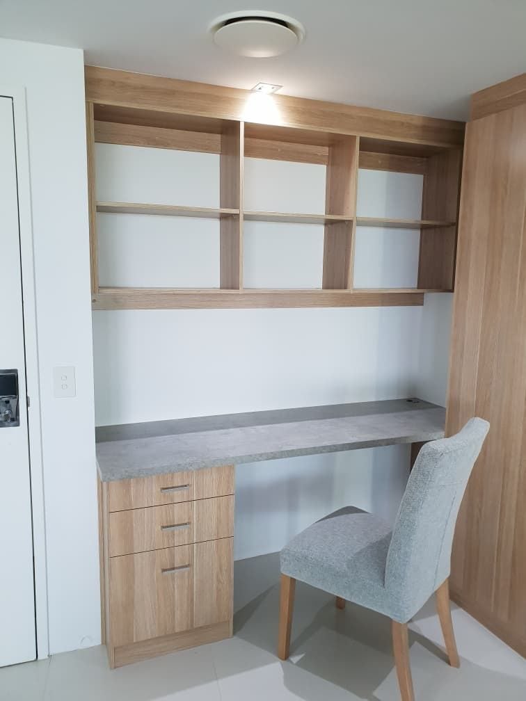 Study & storage for Q1 apartment. Desk top using Flexipanels "Concrete",cabinets using Polytec "Natural Oak Matt"