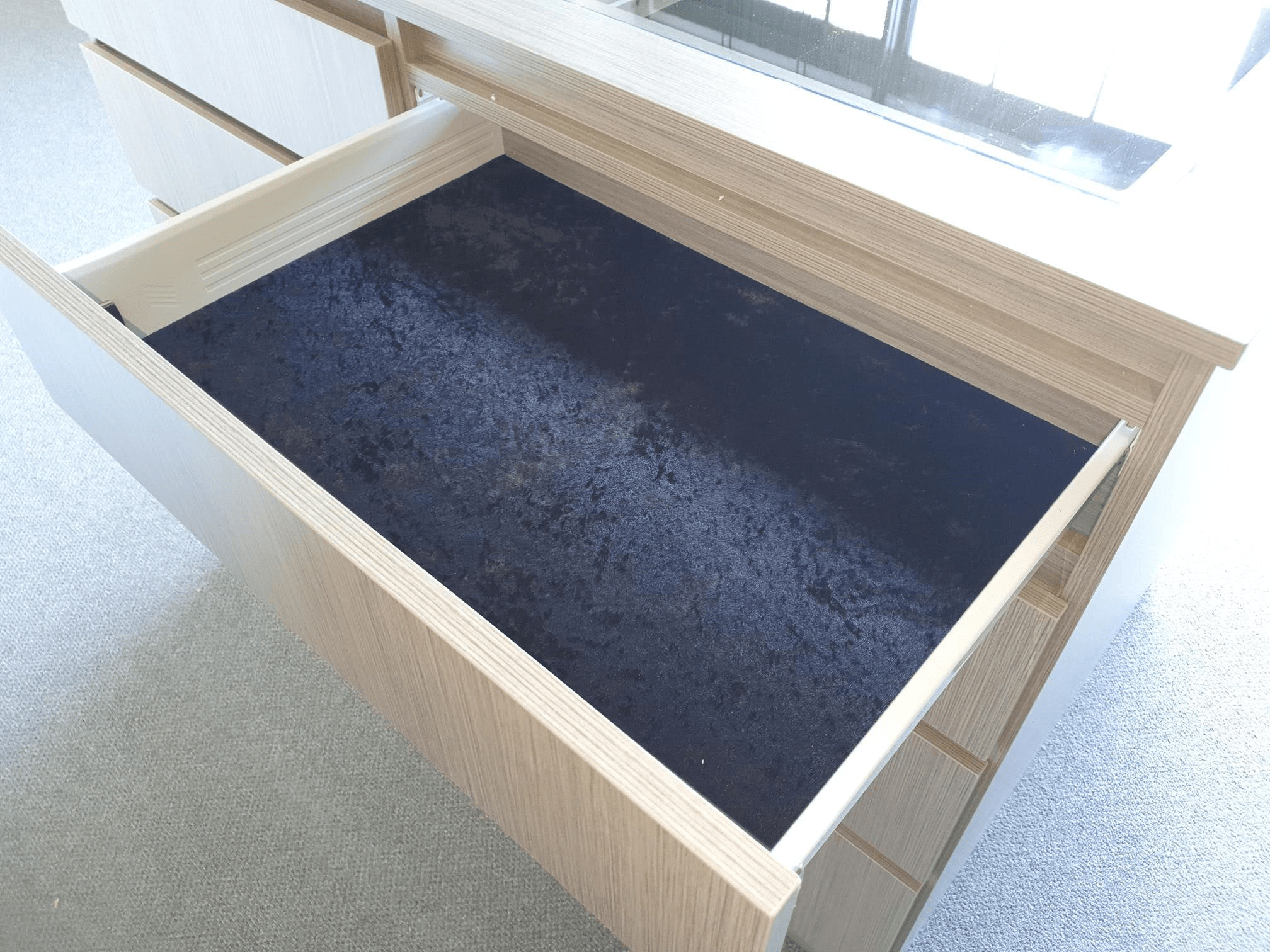Black velour lined drawer