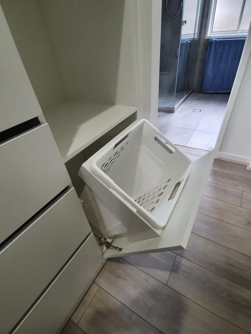 Tilt forward laundry basket