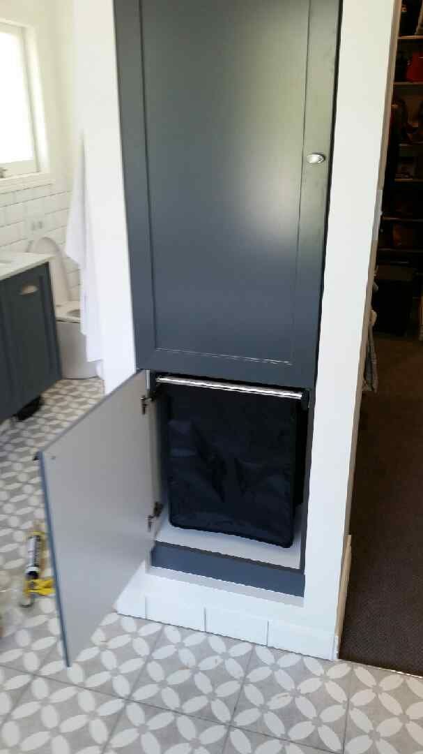 Slide out laundry hamper