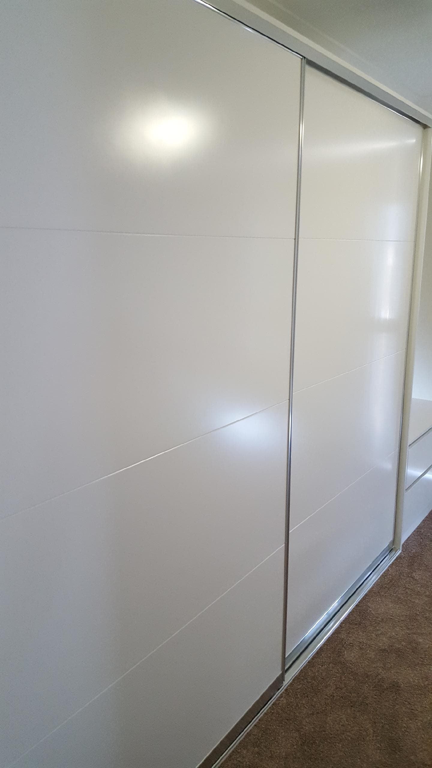 1 set of 2 fully framed sliding doors. 2 pack painted with pencil line profile. Dias Chrome trims & tracks