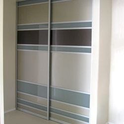 1 set of 2 fully framed divider sliding doors. Combination of painted glass and translucent glass inserts. Satin silver aluminum trims & tracks