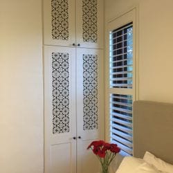 Hinged doors with 2 pack painted finish. Profile bottom panel and powder coated decorative screen inserts. Overhead hinged doors & bulkhead
