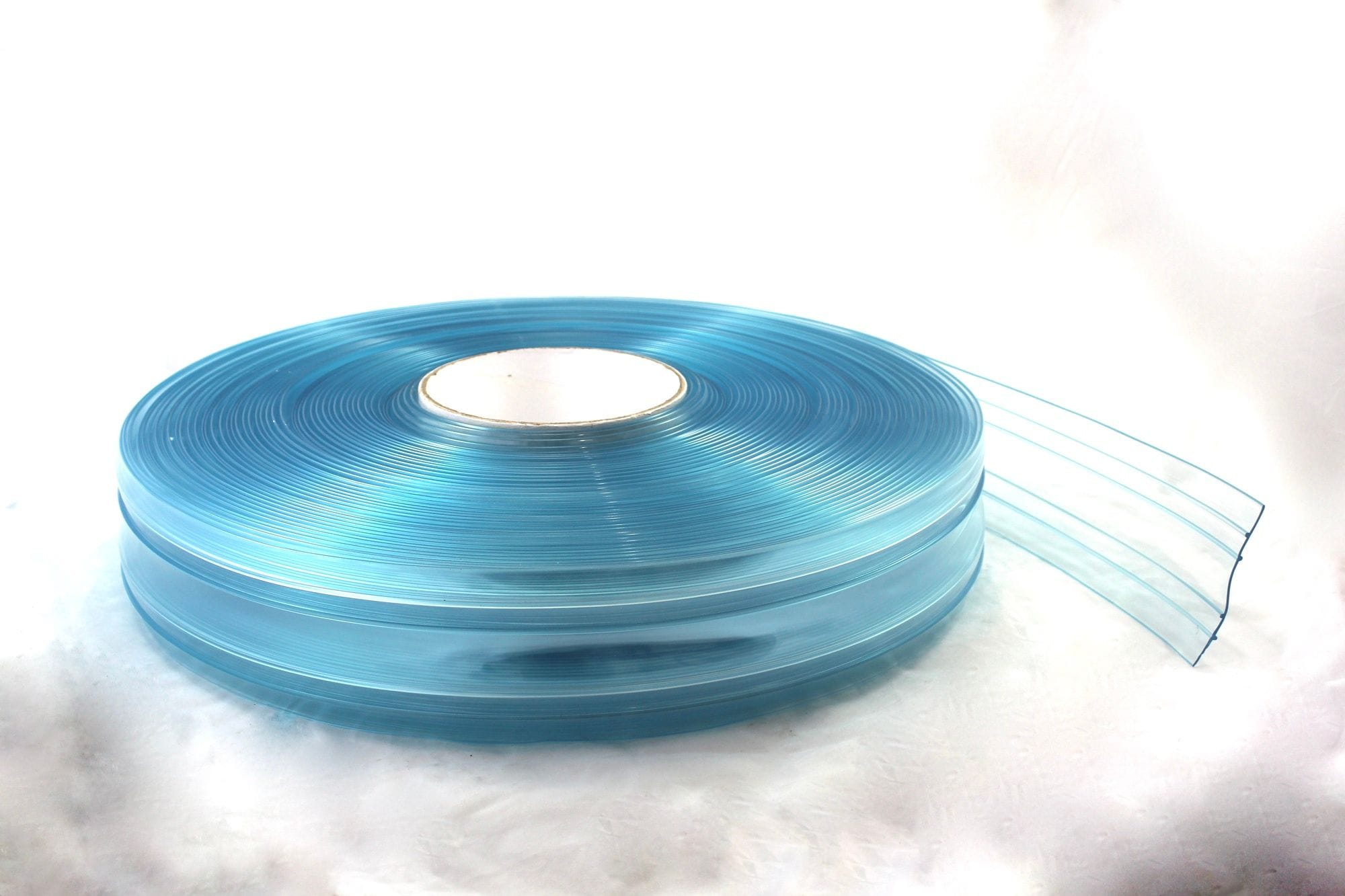 2mm thick x 100mm wide x 50 metres Clear Ribbed PVC Freezer Grade (Weight 12Kg)