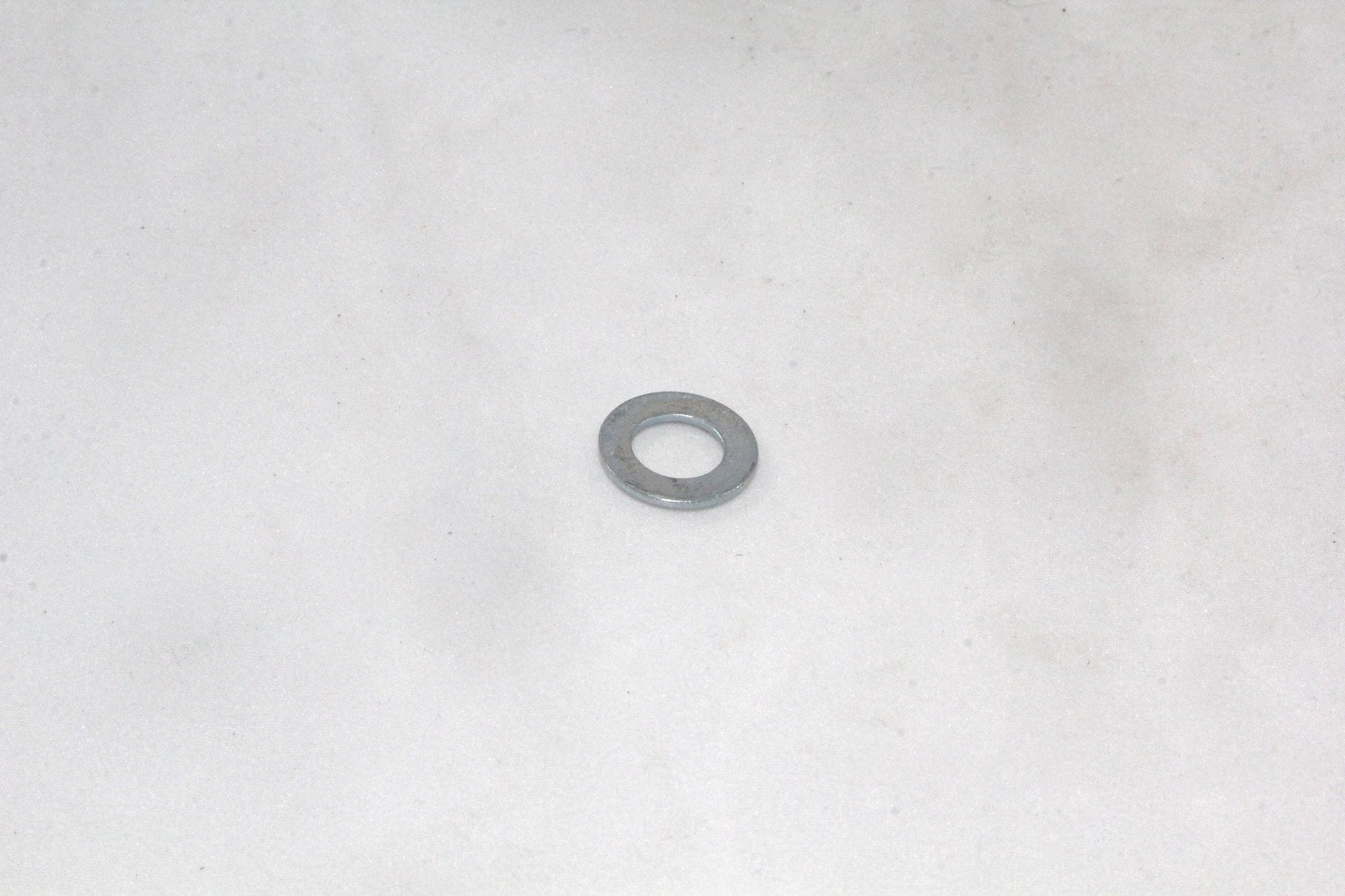 5/16" x 5/8" x 18G Washer Zinc Plated