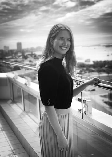 Laura Slogrove - Legal Secretary standing on balcony at IP Partnership | Our Team | Lawyers | Intellectual Property