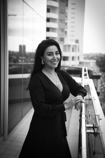 Ania Salehirad Sitting at a desk in IP Partnership | Our Team | Lawyers | Intellectual Property