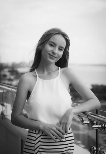 Mia Vine standing on balcony at IP Partnership | Our Team | Lawyers | Intellectual Property